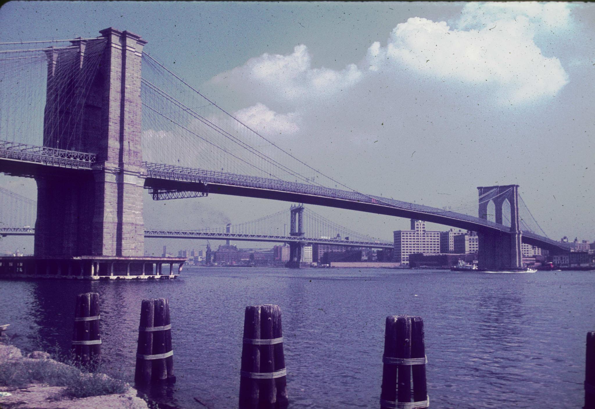 Three-quarter view of the Brooklyn Bridge.  