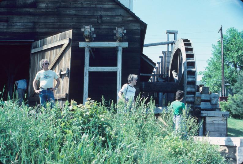 Entrance to forge building with adjacent water wheel