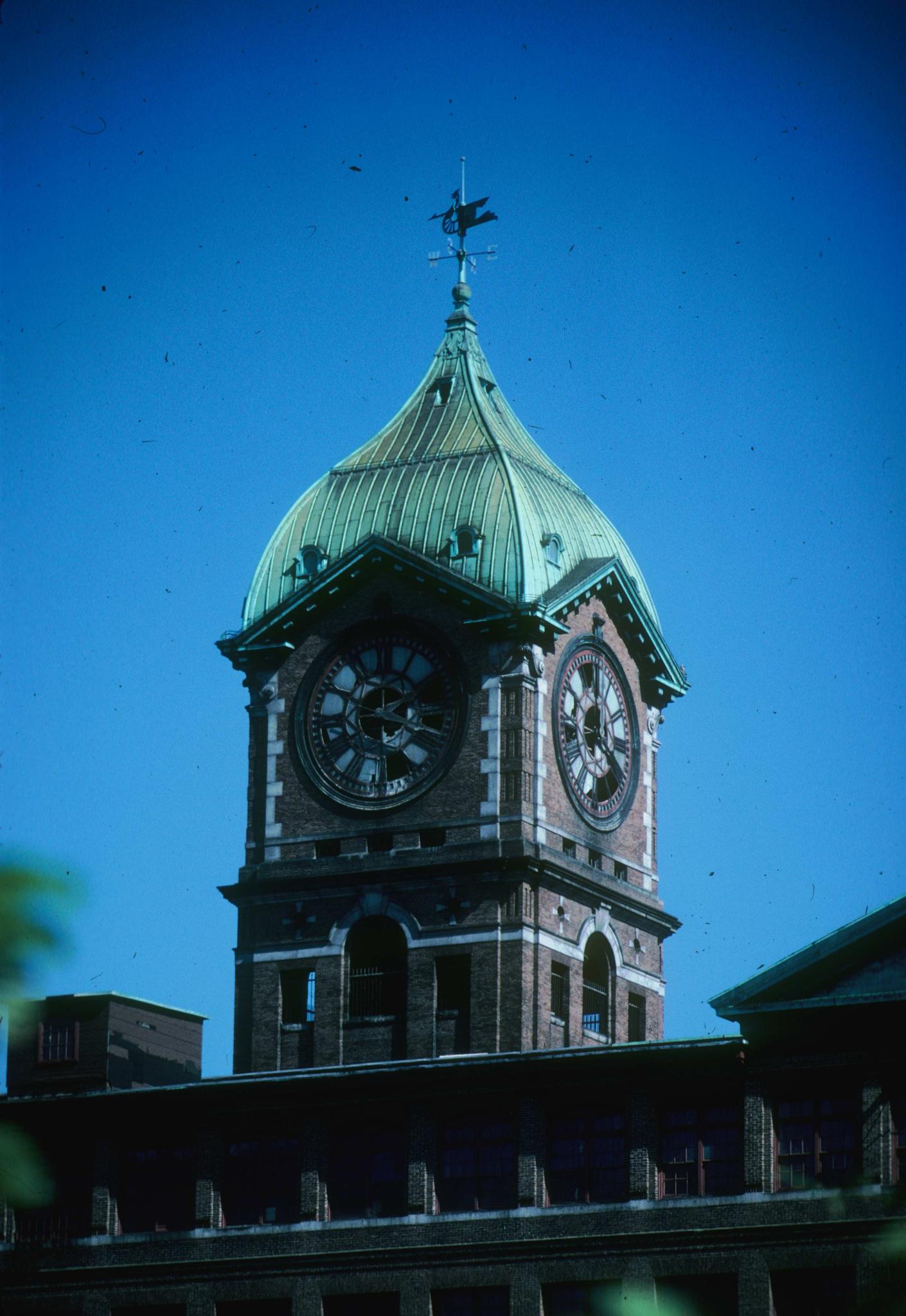 Close-up photograph of the mill clock tower.