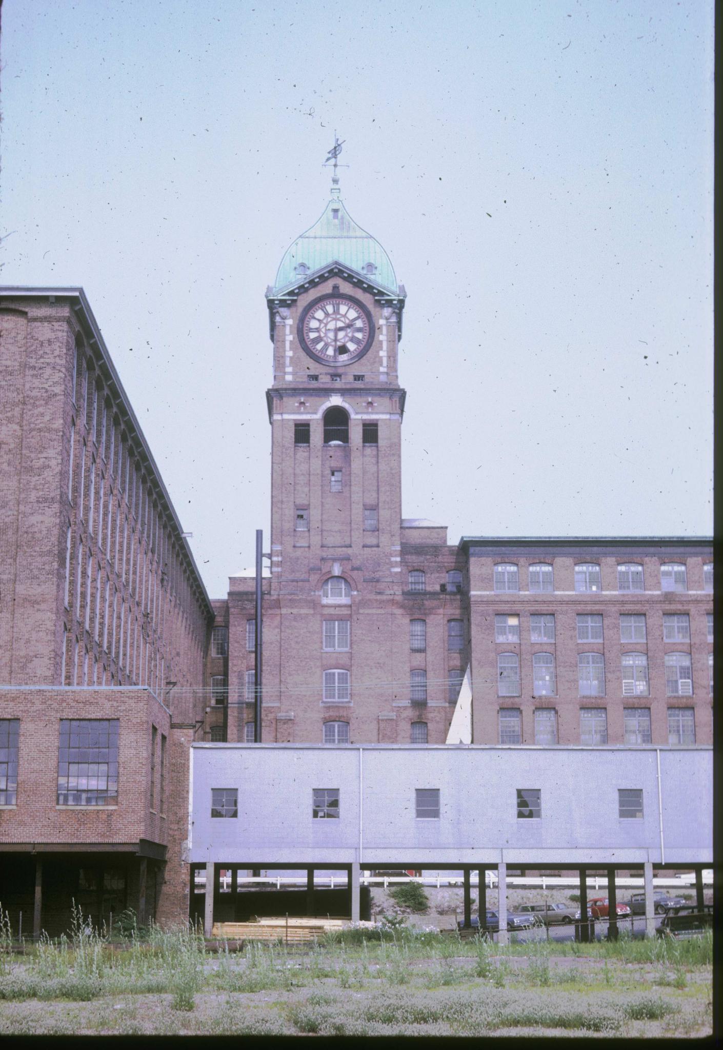 Photograph of the mill clock tower from the west.