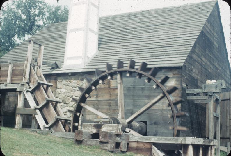 Undershot water wheel adjacent forge building