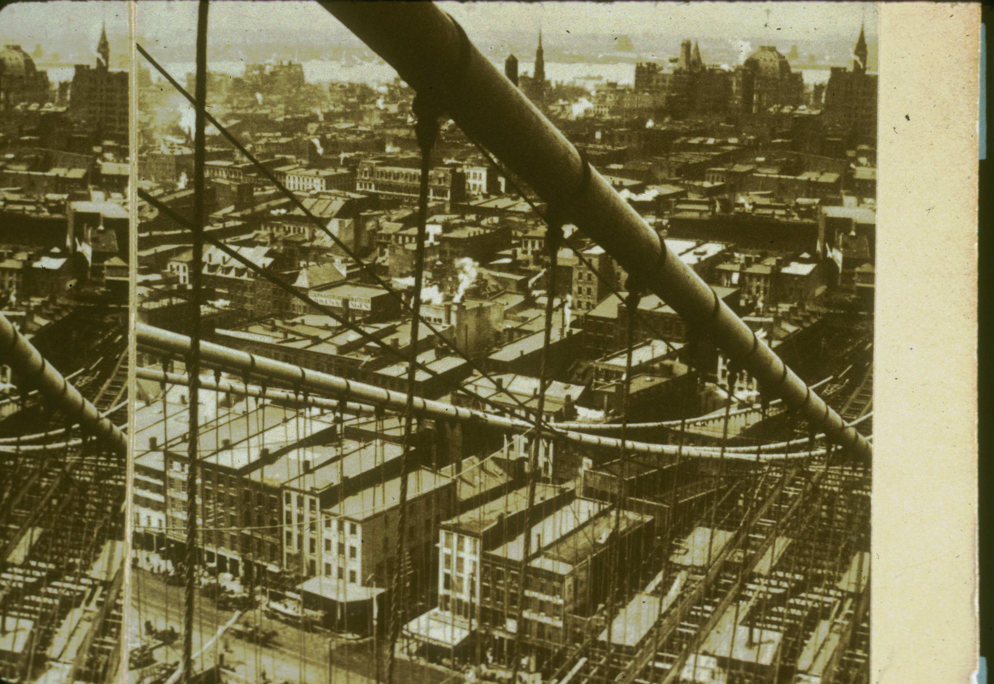 Historic photograph of the Brooklyn Bridge showing the completed cables circa…