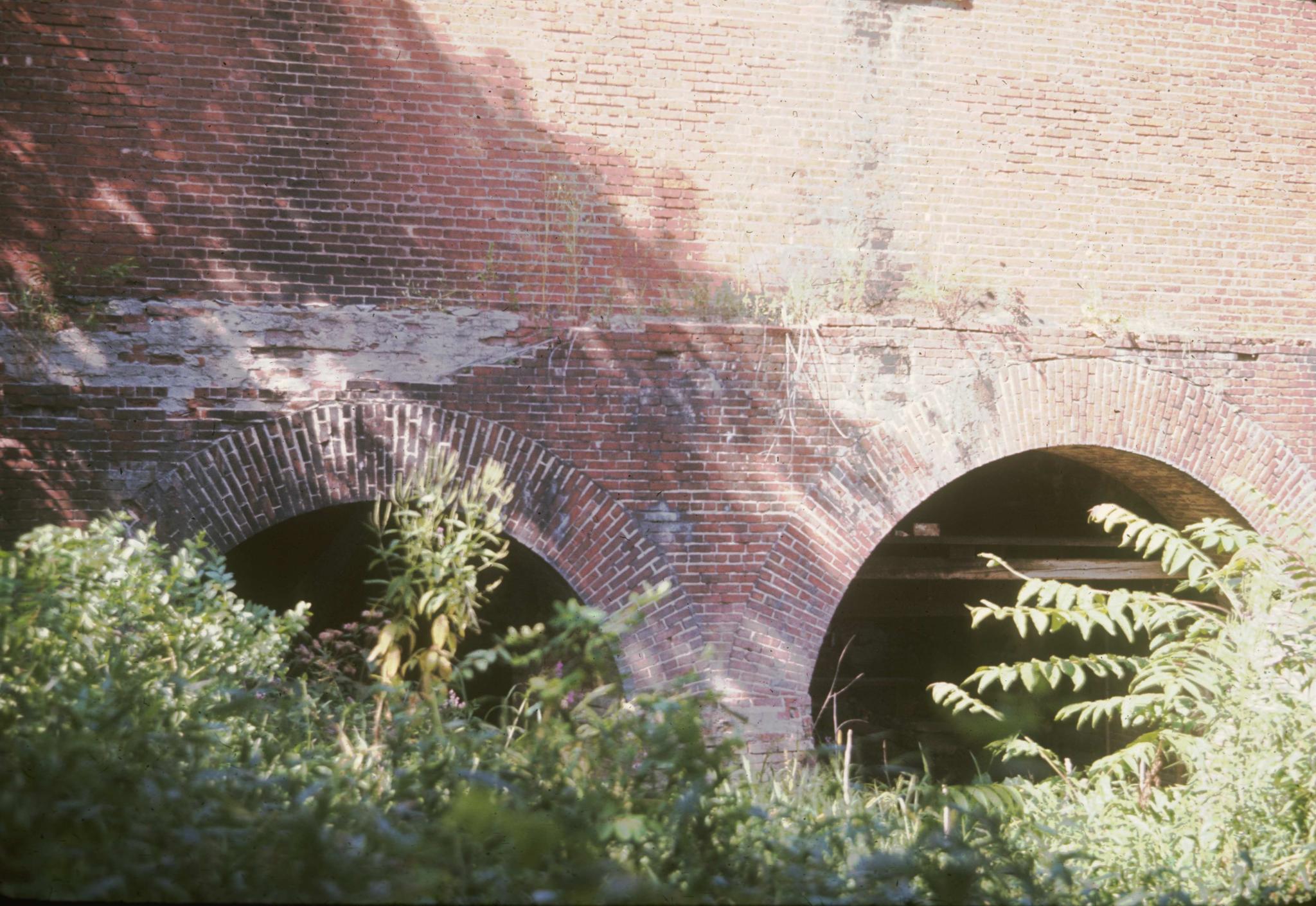 Photograph of the brick arches of the tailrace of an unidentified mill on Union…