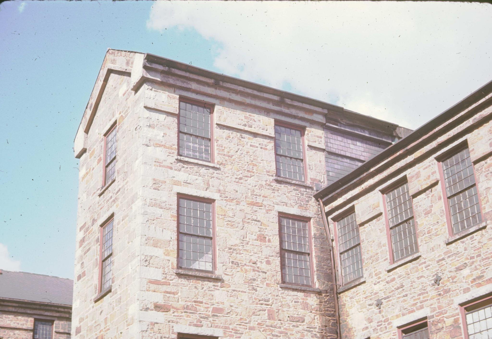 Photograph of the south main tower of an unidentified 1846 machine shop in…