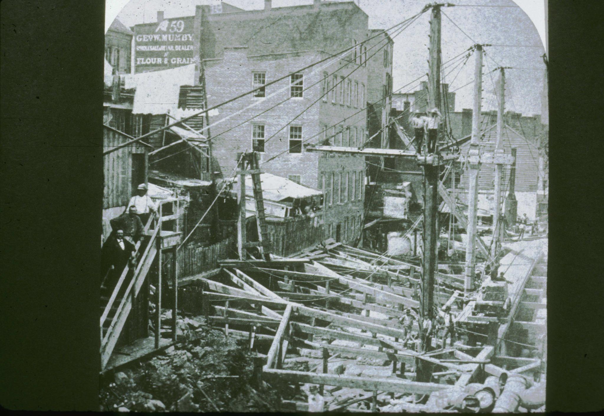 Historic photograph of the clearing of the anchorage site for the Brooklyn…