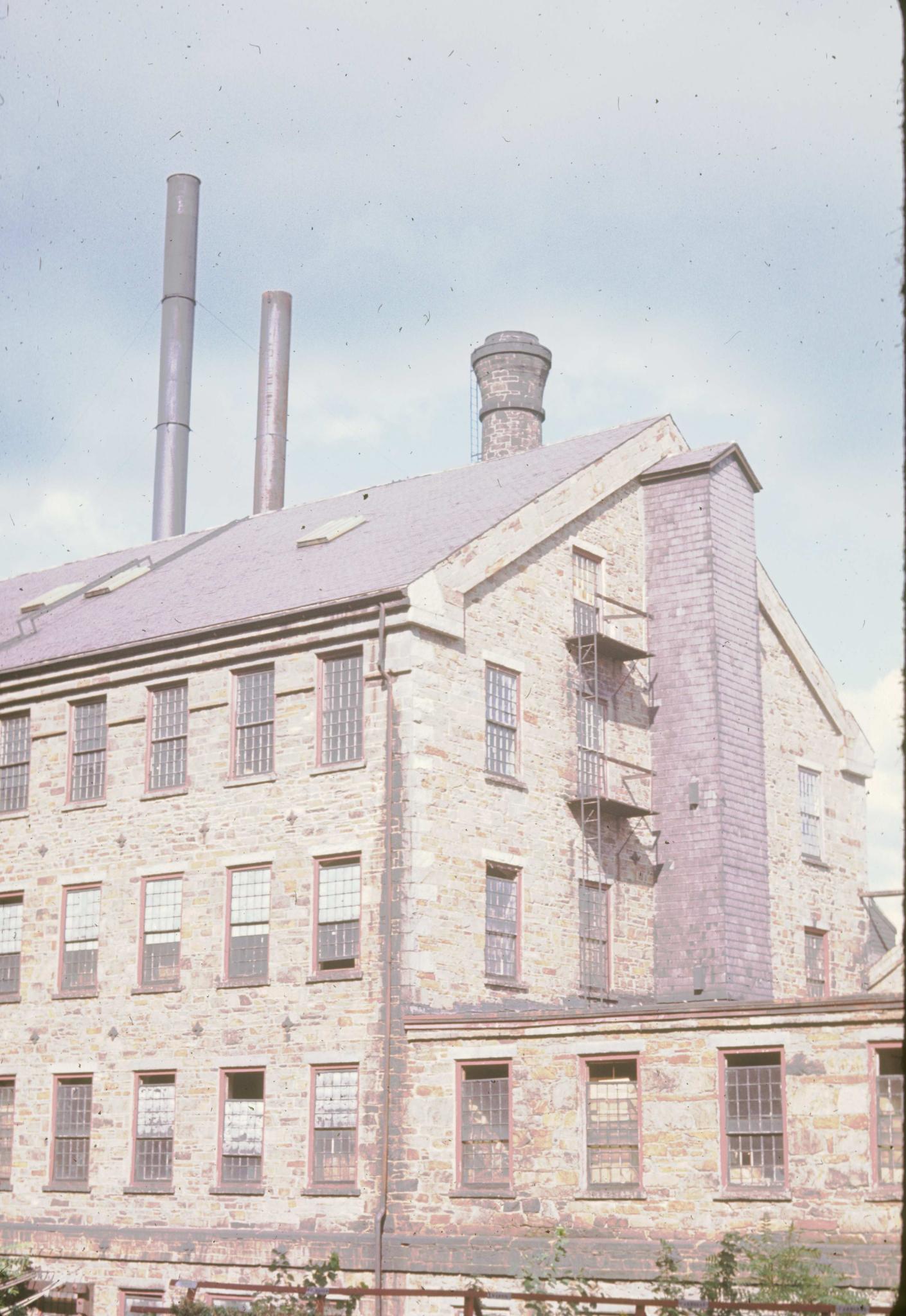 Photograph of the south end of an unidentified machine shop in Lawrence,…