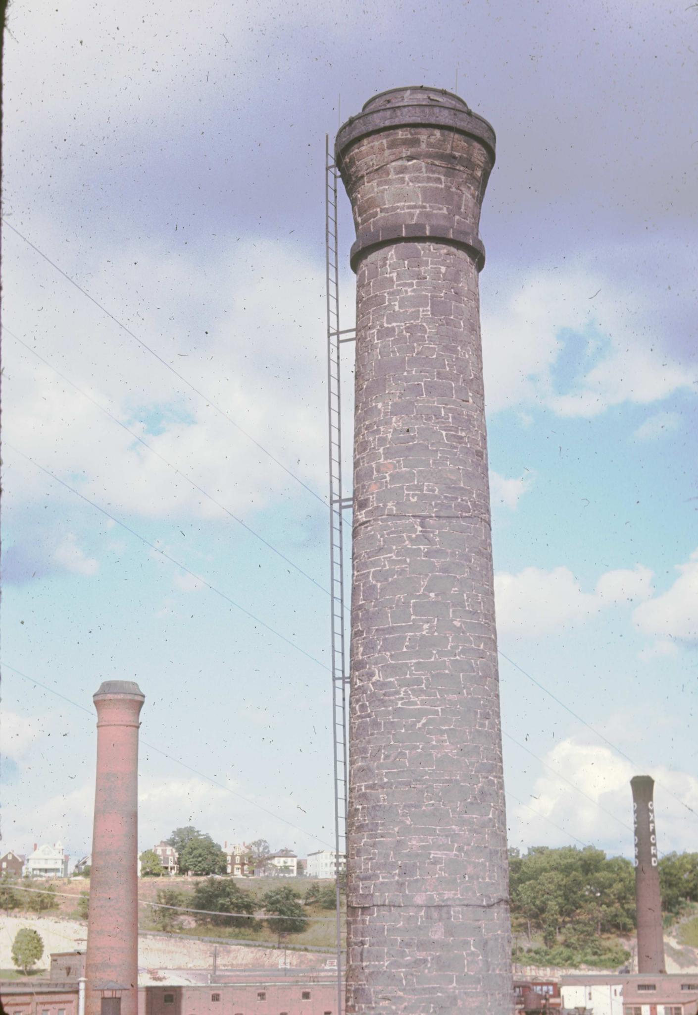 Photograph of a stone chimney of an unidentified 1846 machine shop in Lawrence…