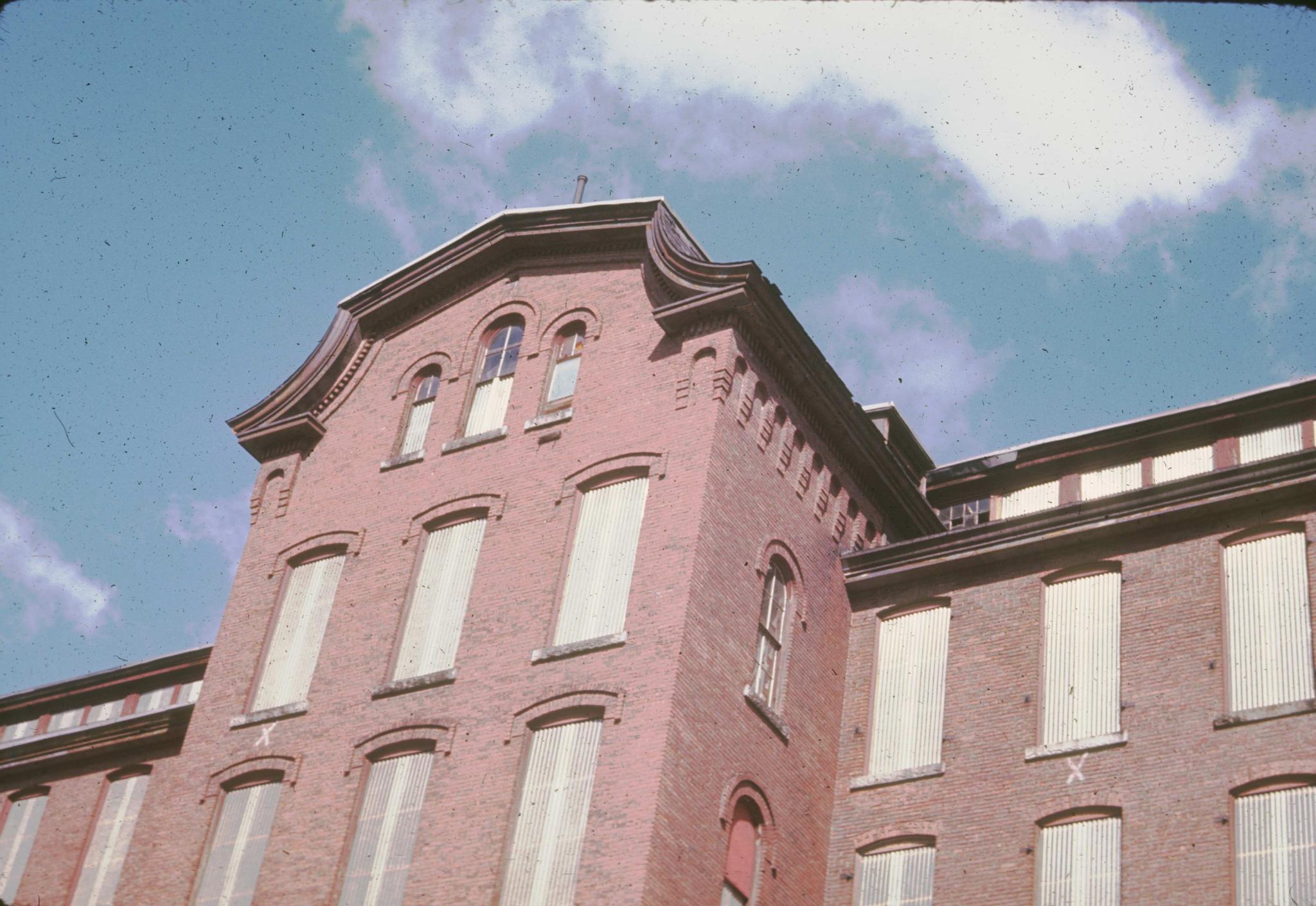 Photograph of the west tower cornice of the mill.