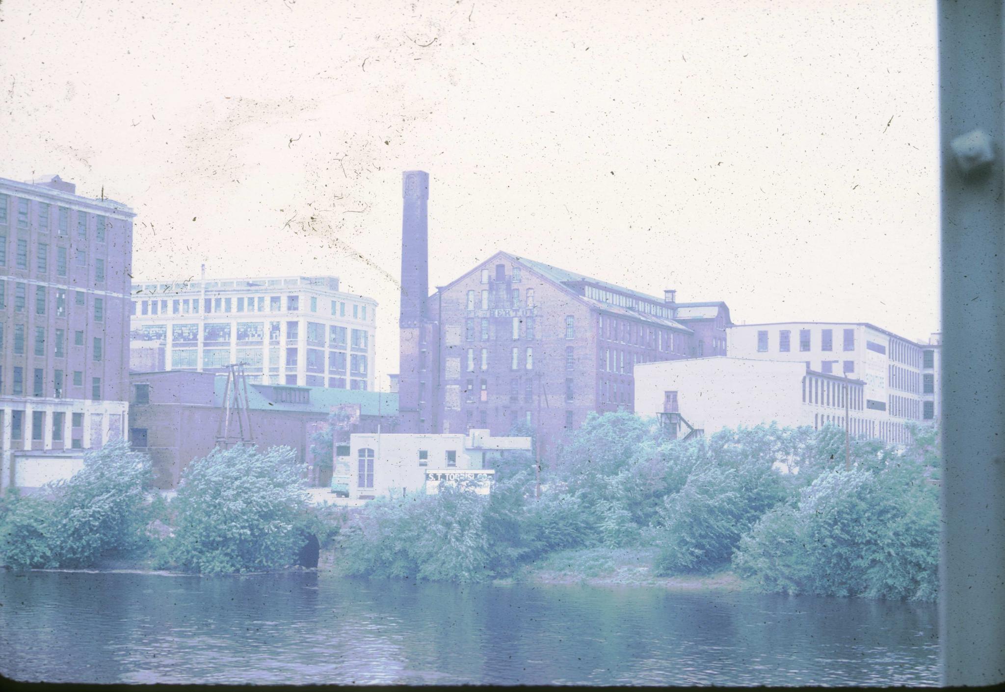 Photograph of the mill taken from the Union Street bridge.  The slide is badly…