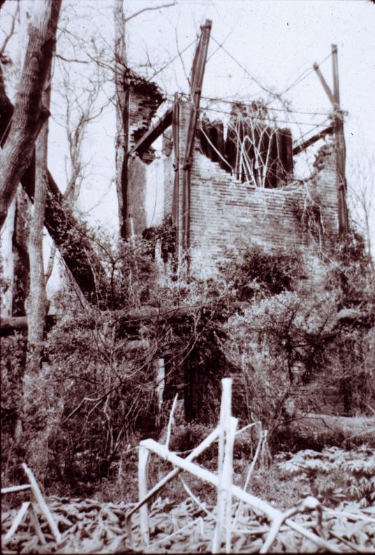 B&W image of partially collapsed furnace stack with \"air heater\"