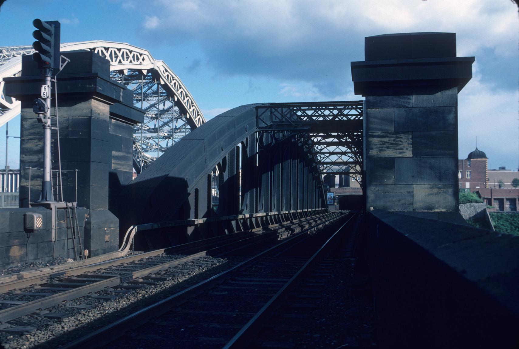 This is a view of the railroad bridge, built in 1879, that adjoins the…