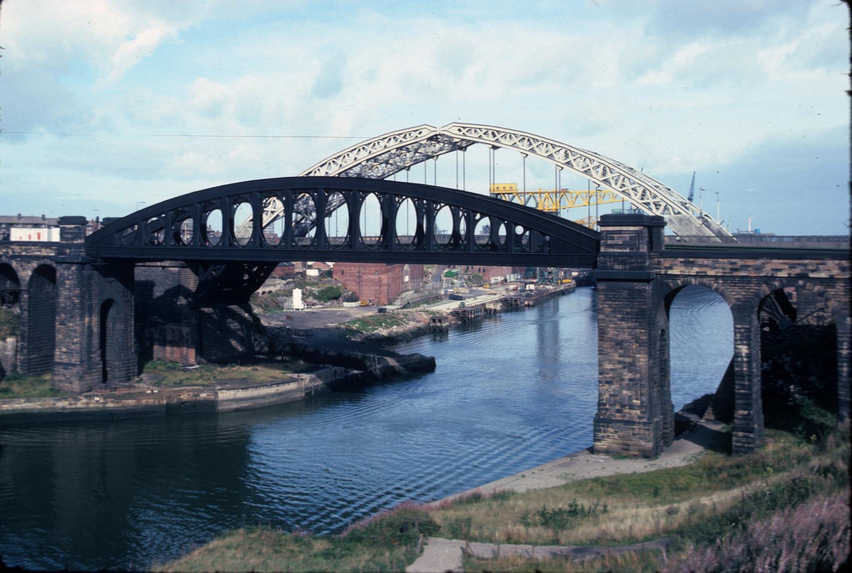 Hog-back railway bridge constructed from wrought iron box girders with two…