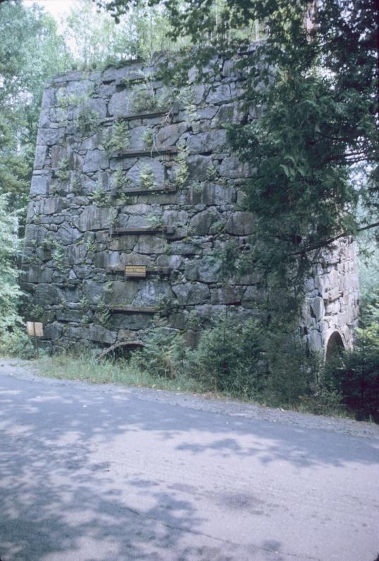 View of exterior of masonry blast furnace near Tahawus, Essex County, NY.