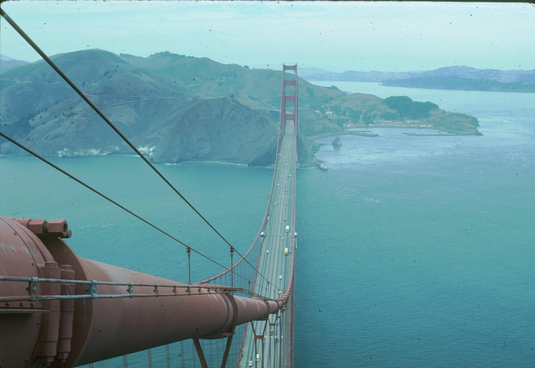 Photograph of the Golden Gate bridge taken from one of the towers.