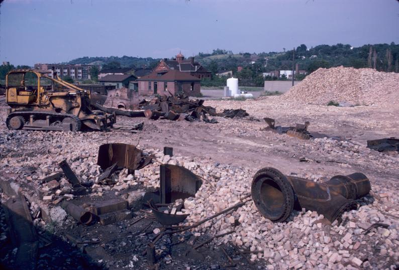 View of pipe fragments, brick rubble, and other debris from furnace demolition…