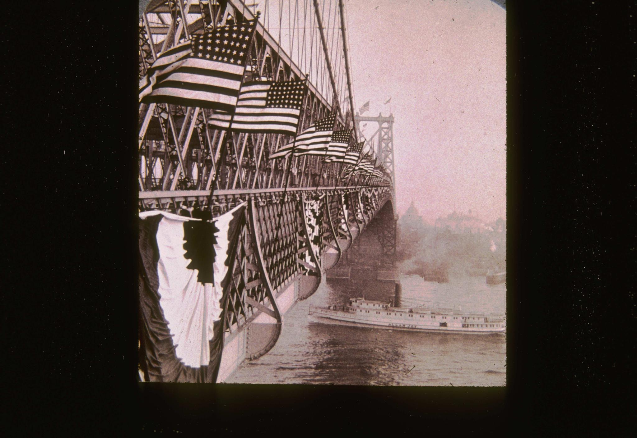 Historic photograph of the Williamsburg Bridge taken circa 1904.  The…