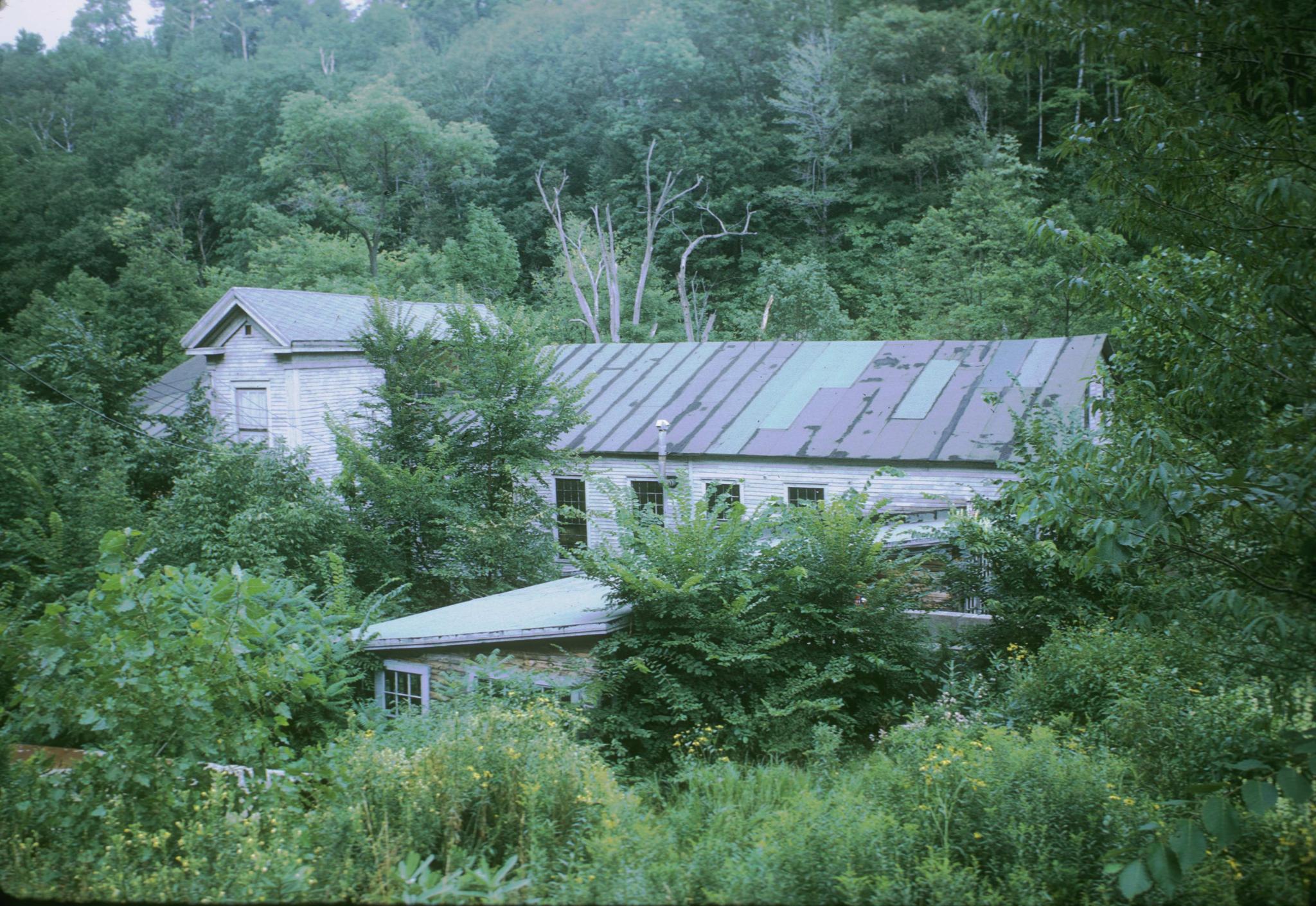 Photograph of an unidentified frame textile mill located south of Adams,…