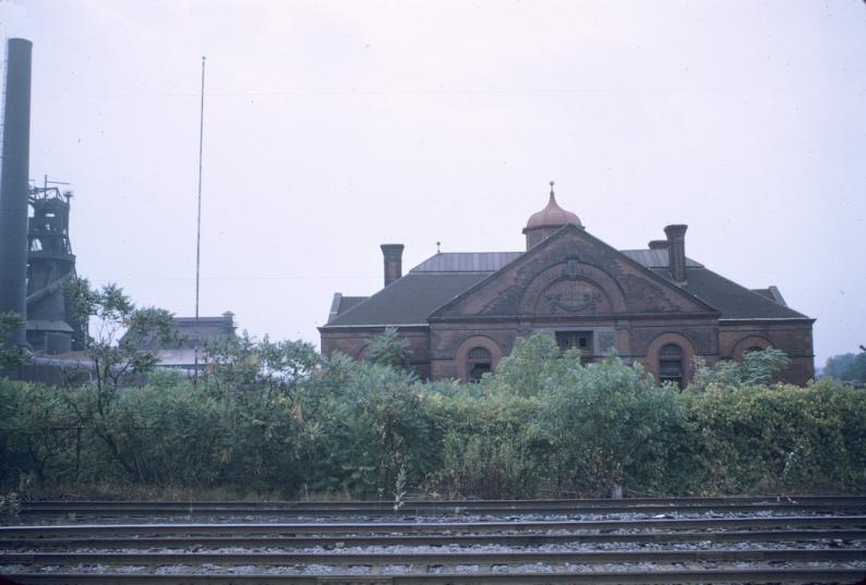 View of Henry Burden's office building, with blast furnace and railroad…