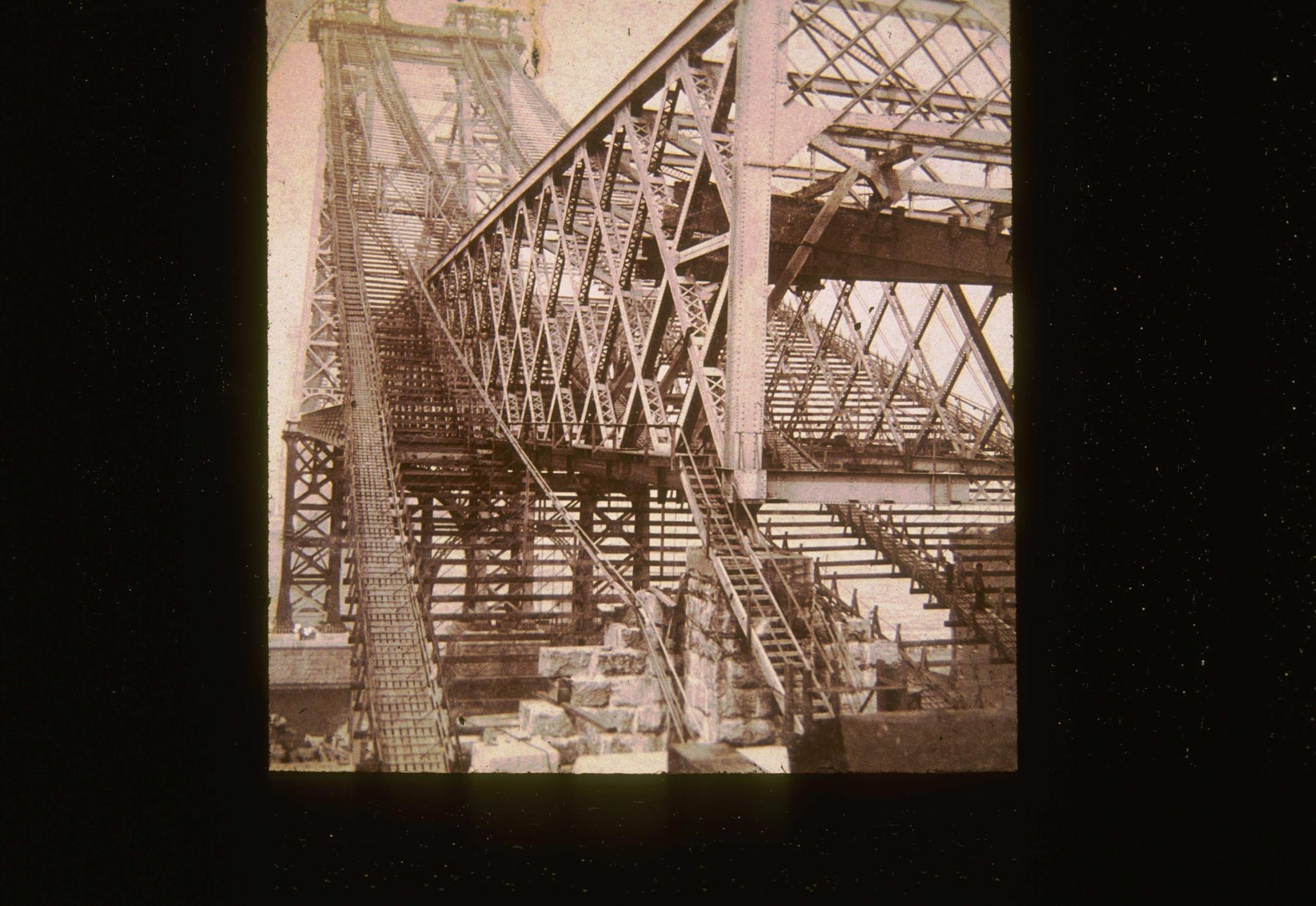 Historic photograph of the Williamsburg Bridge circa 1903.  The bridge is under…