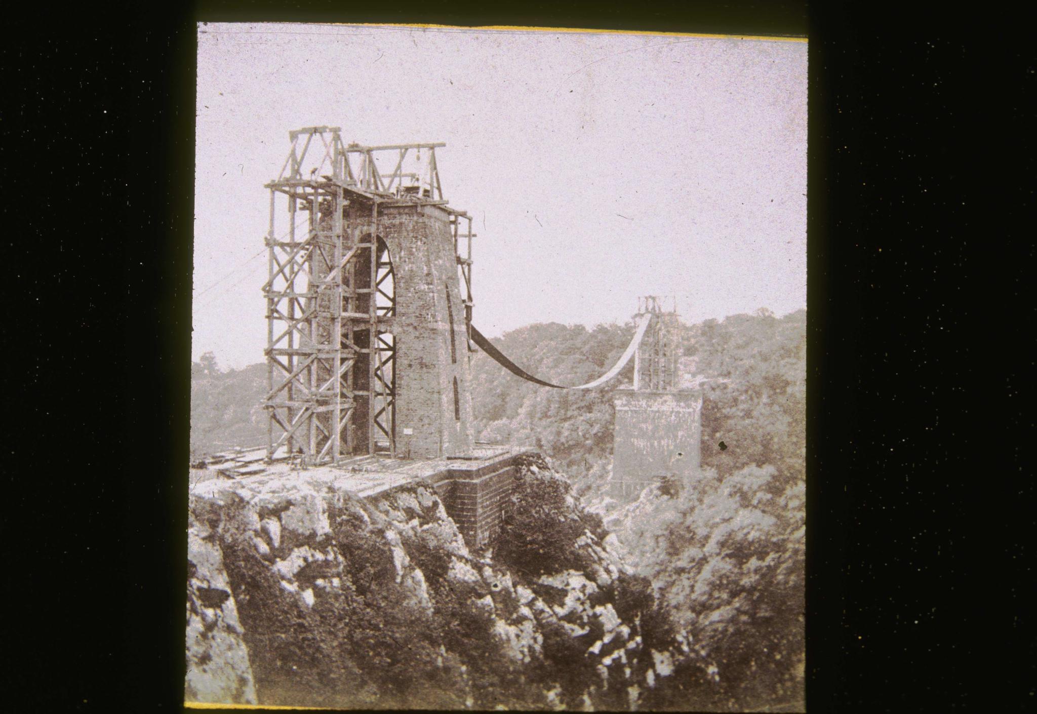 Historic photograph of the Clifton bridge under construction.  Photograph shows…