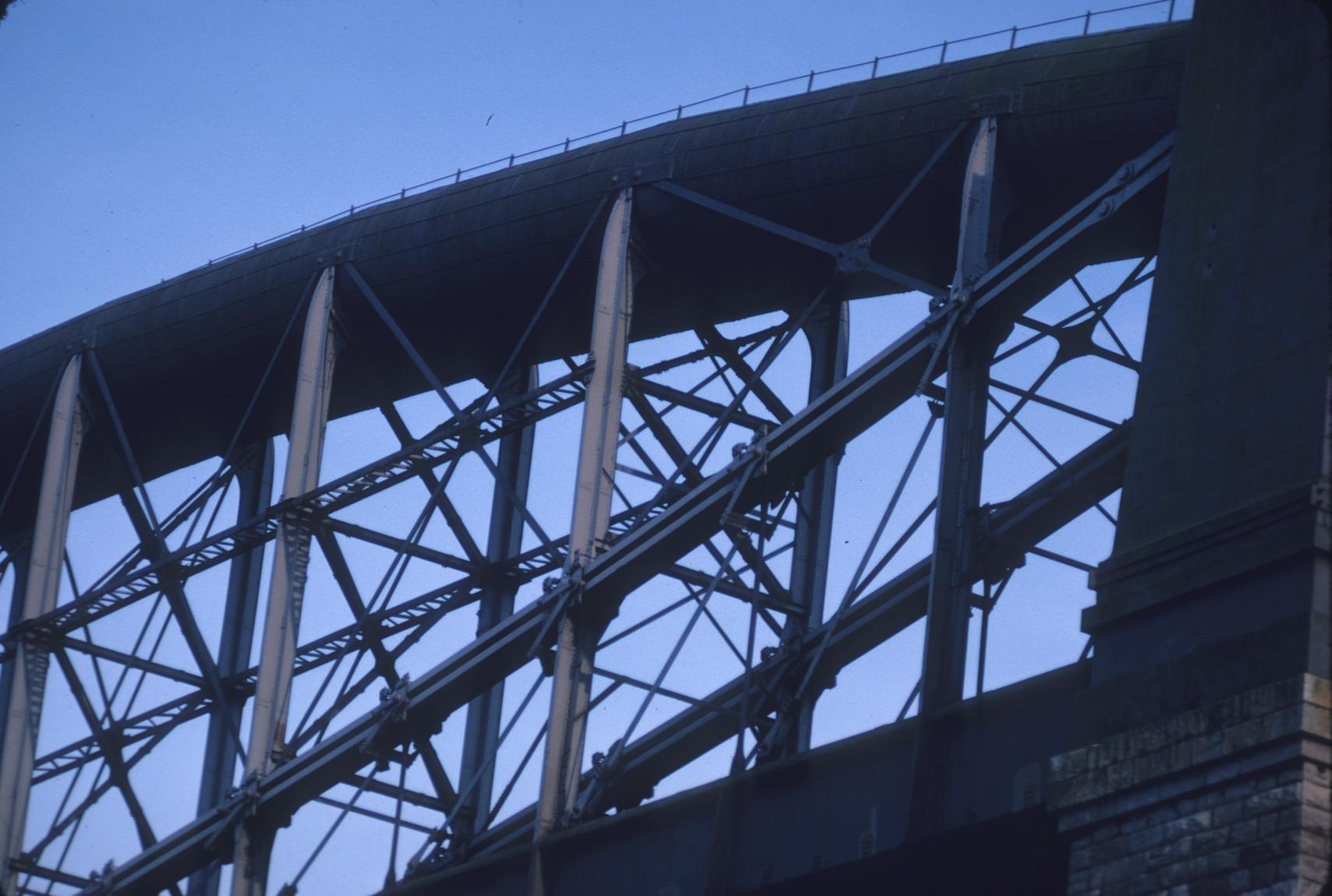 Detail of arch, suspension chains, and trusses supporting the Royal Albert…