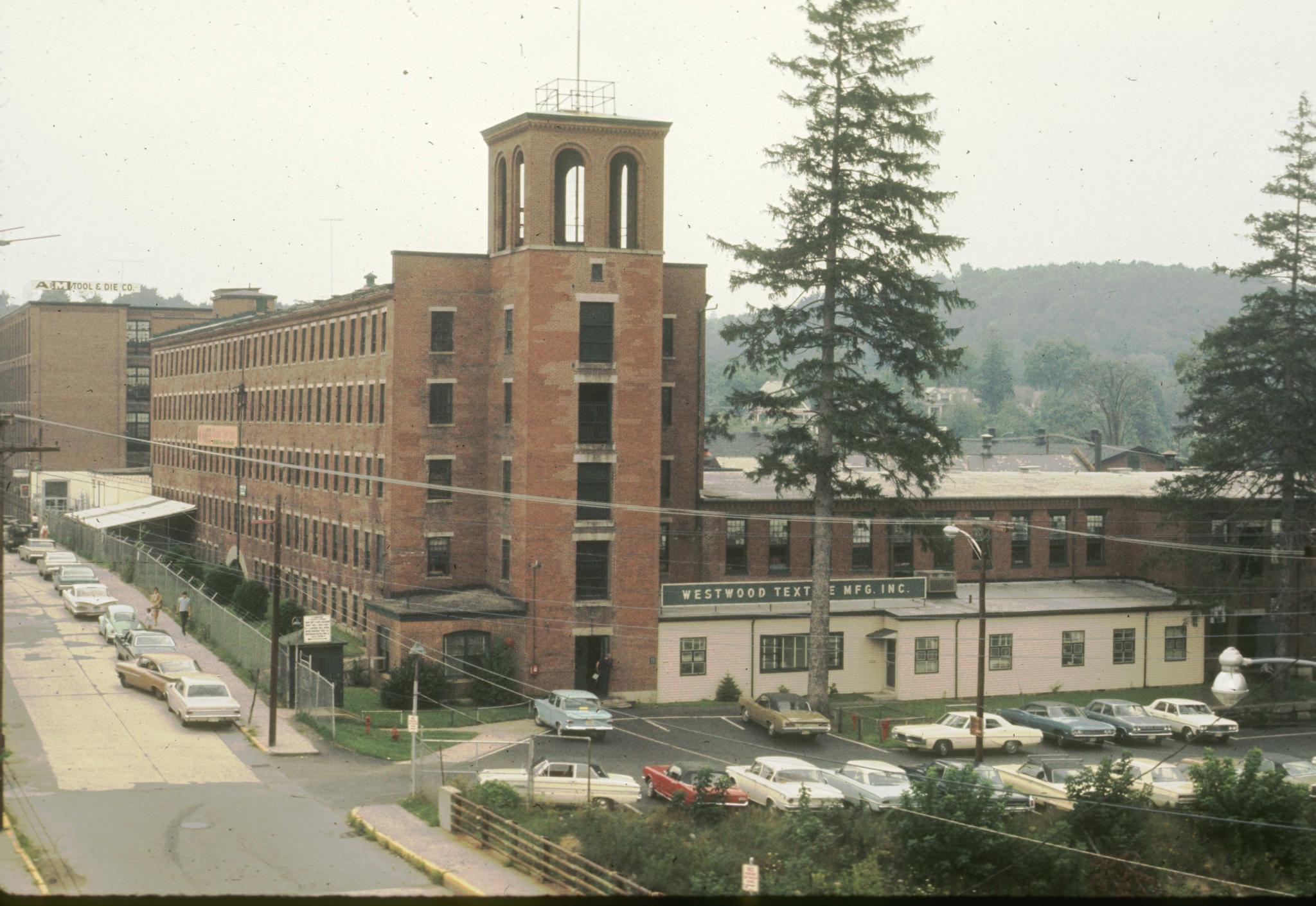 Photograph of an unidentified brick mill in Globe Village, Southbridge,…