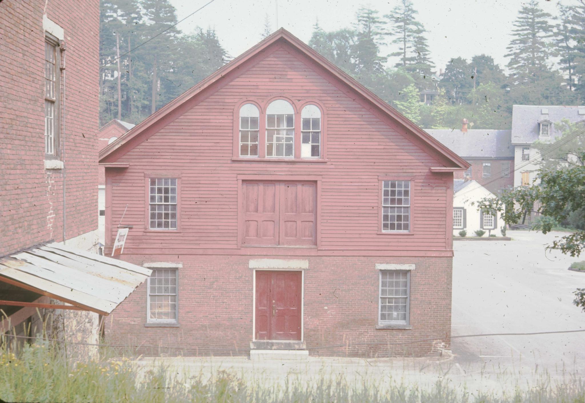 Photograph of mill buildings.