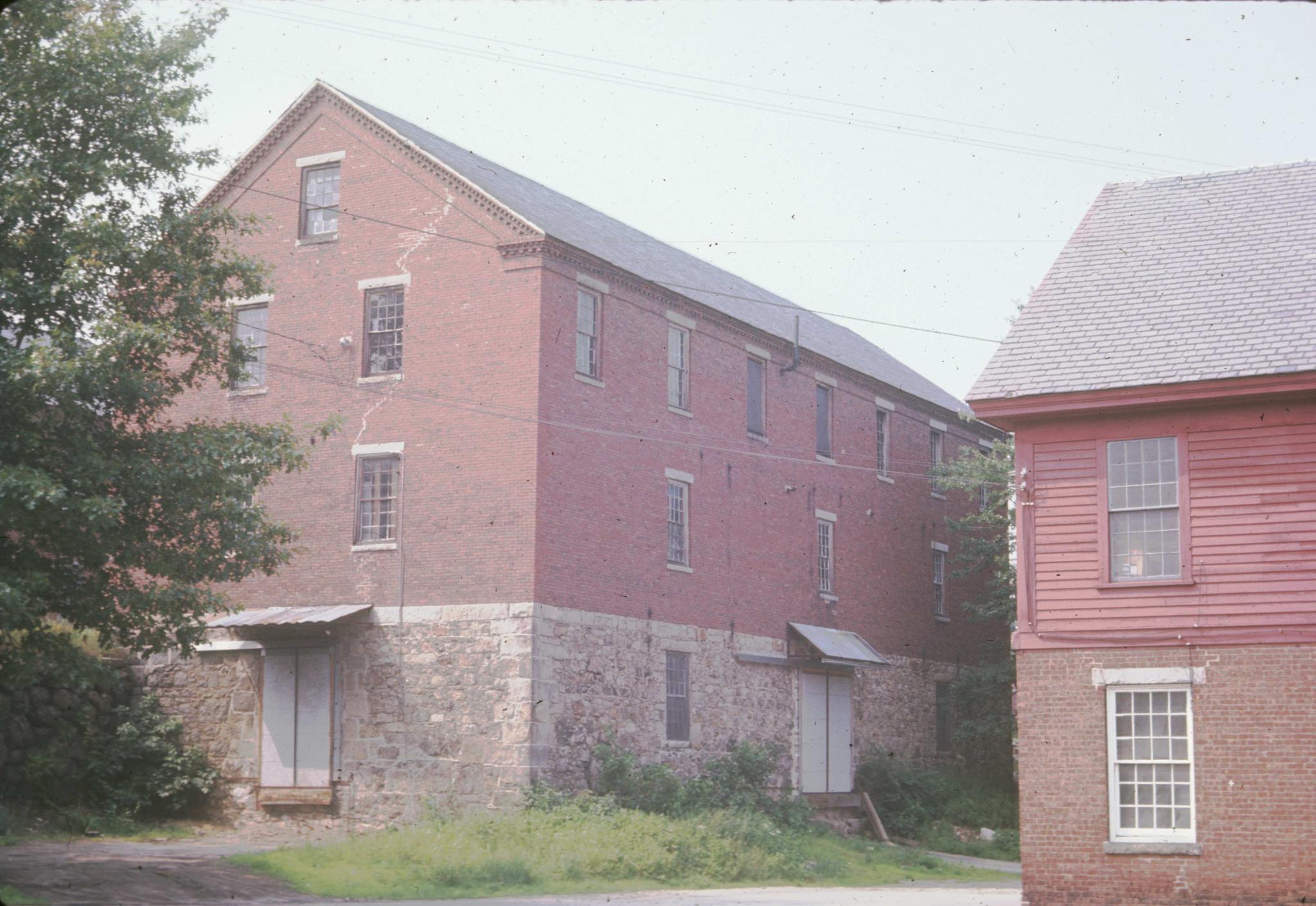 Photograph of mill buildings.