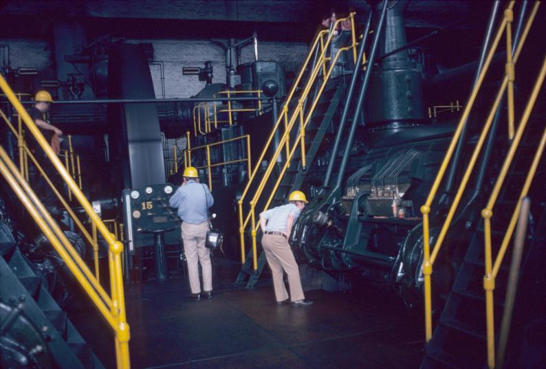 View of ca. 1912 gas blast engines with SIA tour members.