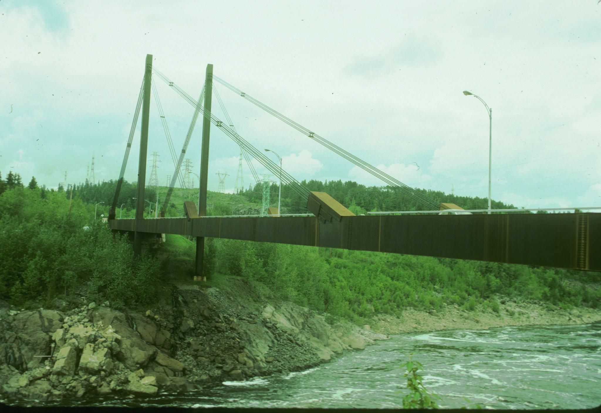 Photograph of an unidentified cable-stay bridge in Quebec.  Three quarter view.