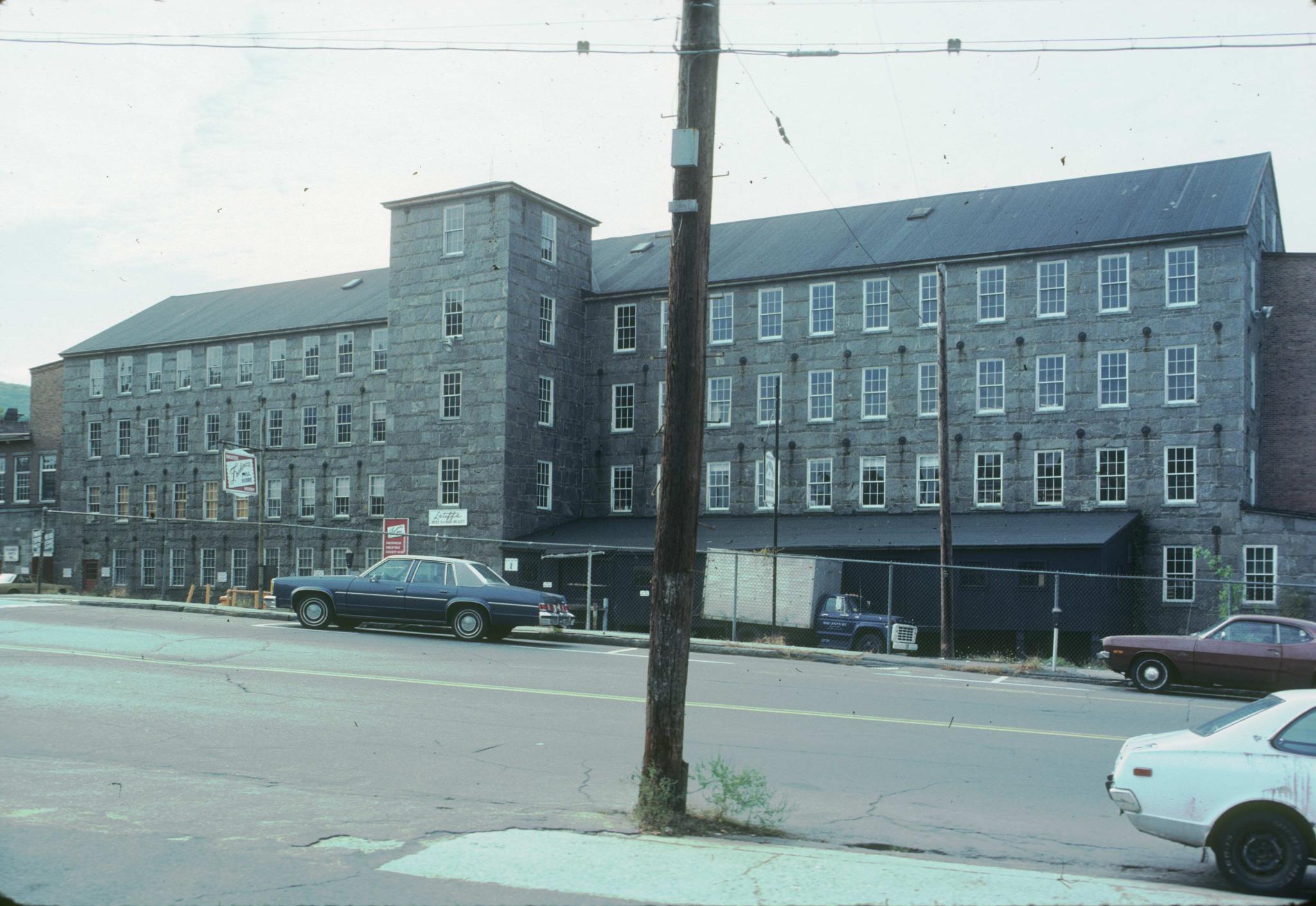 Photograph of an unidentified stone mill in Ware, Massachusetts.