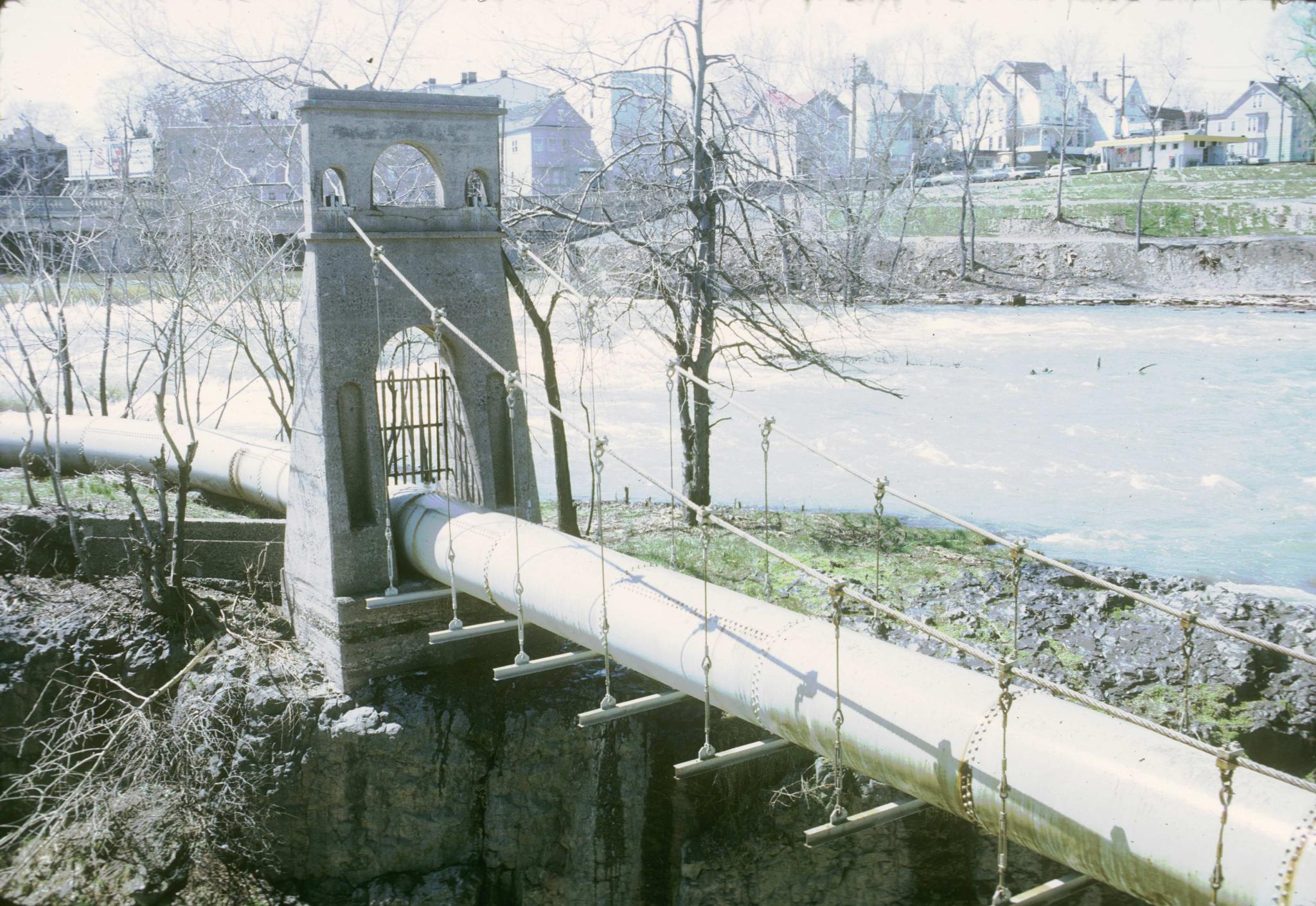 Photograph of an unidentified pipe suspension bridge near Paterson, New Jersey…