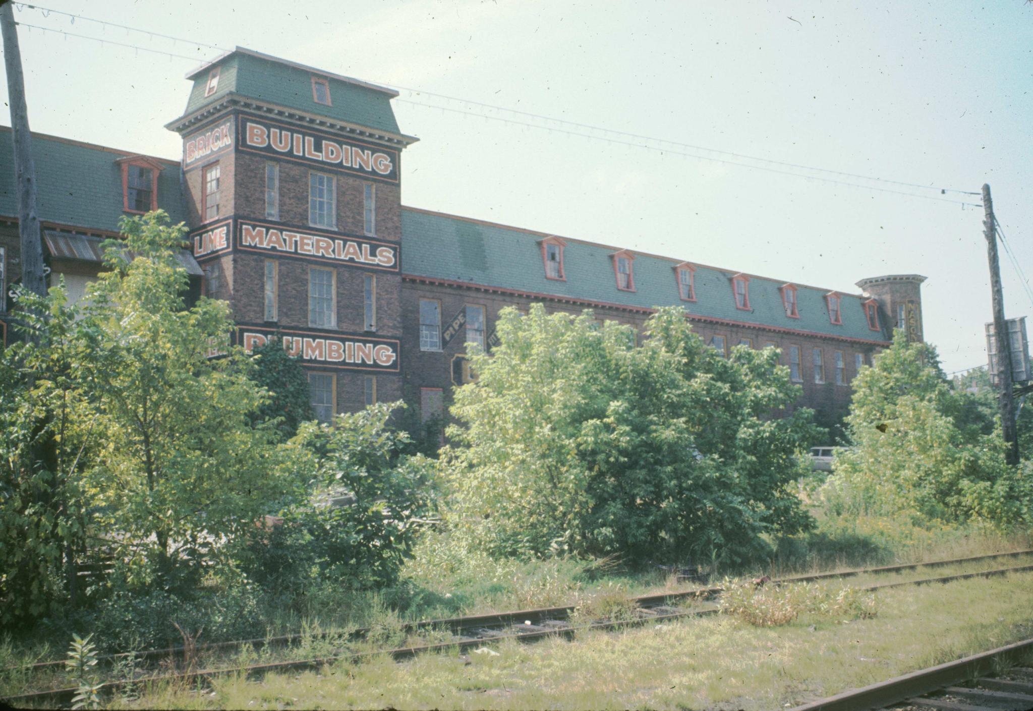 Photograph of an unidentified brick mill in Taunton, Massachusetts.