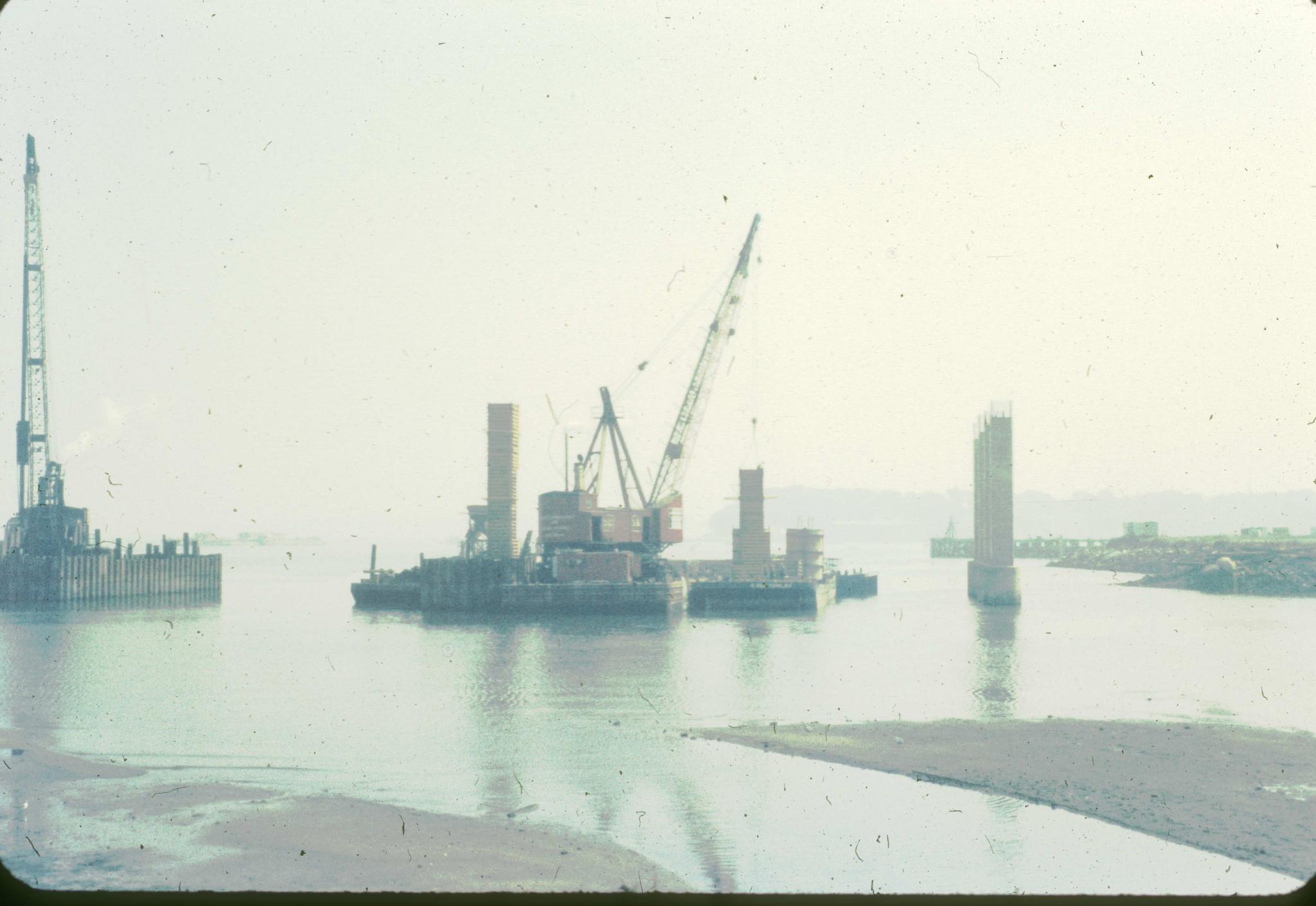 Photograph of construction on piers of the approach to the Throg's Neck…