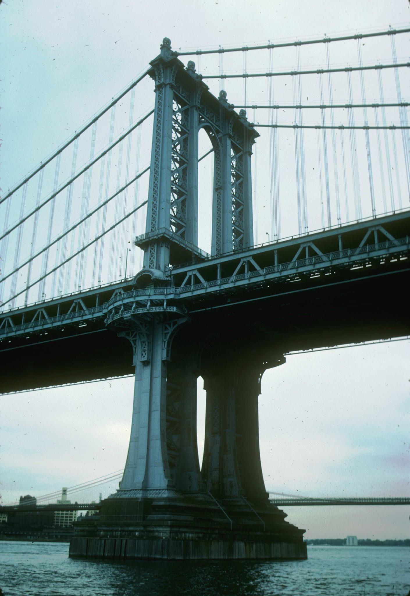 Photograph of a support tower of the Manhattan Bridge.  Photograph is taken…