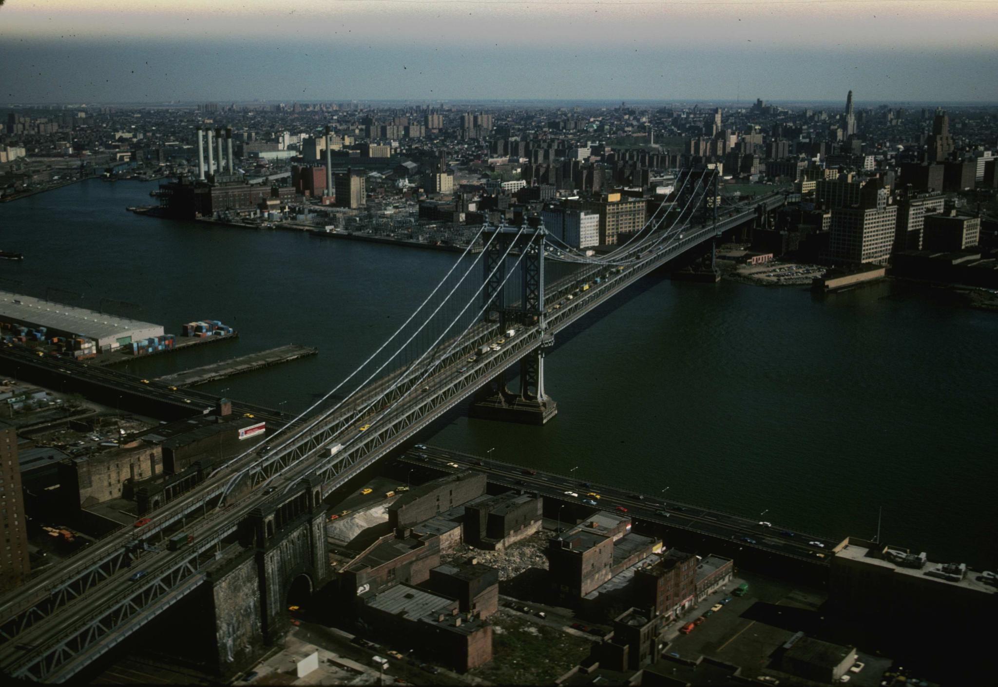 Aerial view of the Manhattan Bridge including an anchorage in the foreground. 