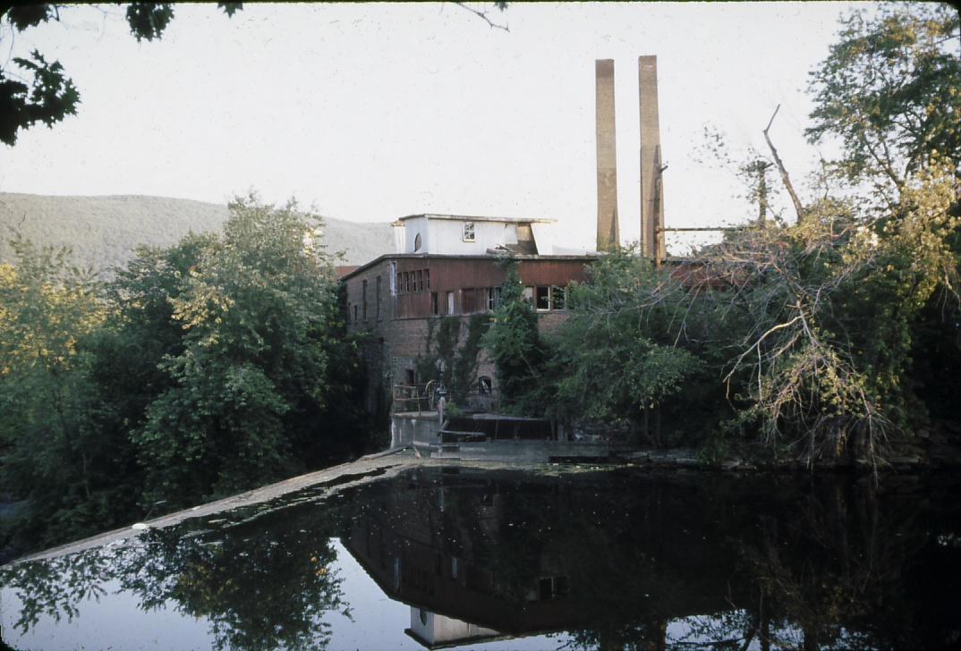 View of paper mill, stacks, East Canada Creek and dam.