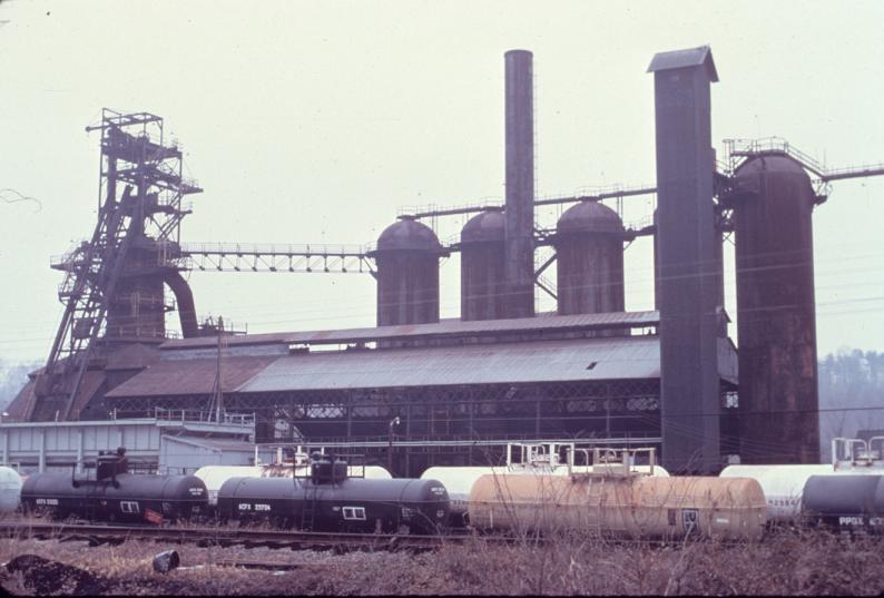 Photograph of E.J. Lavino blast furnace at Lynchburg, Virginia.  Tanker cars in…