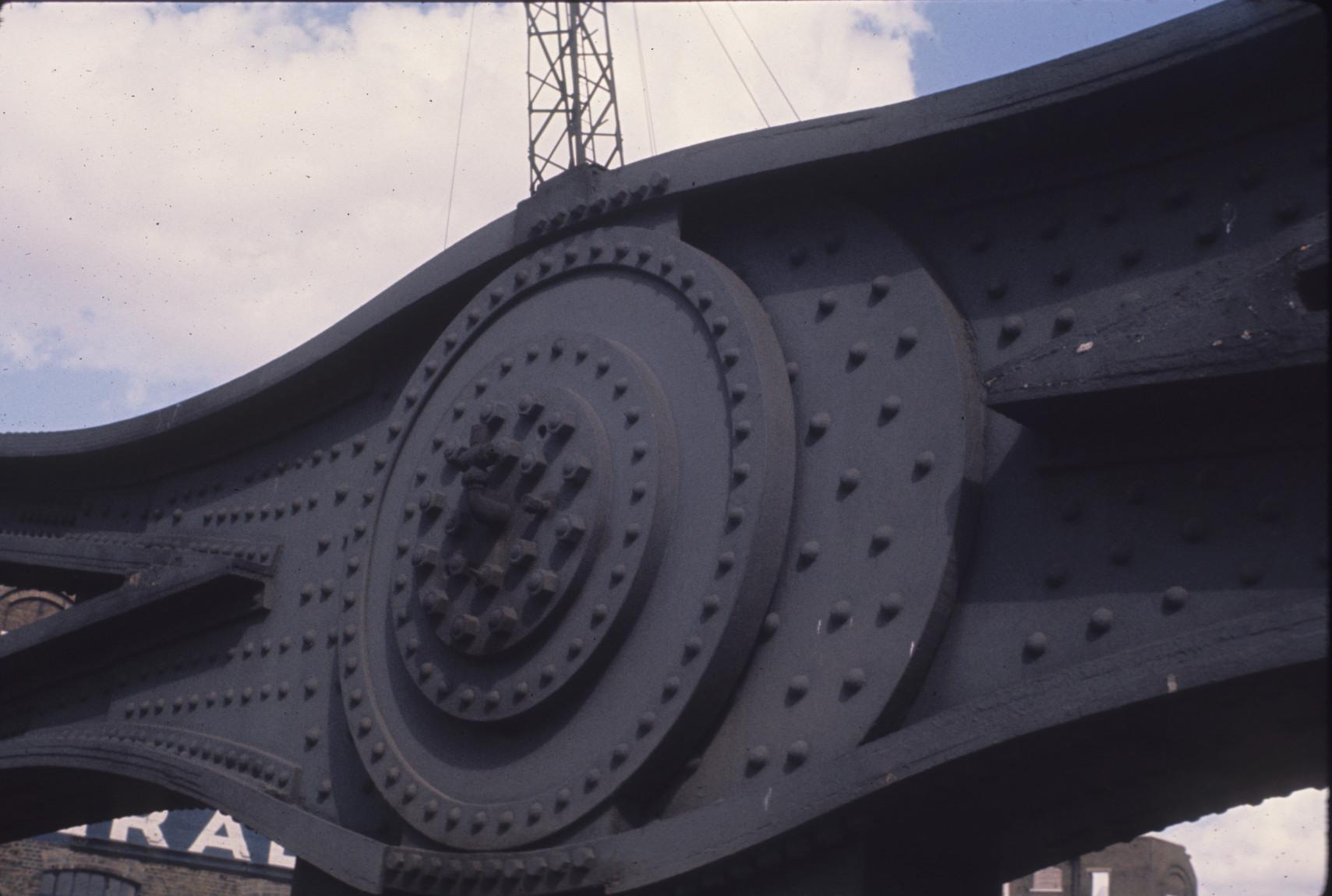 Detail of circular riveted joint on the suspension structure of Tower Bridge.