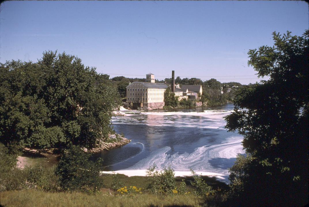 Distant view of paper mill on Androscoggin River in Topsham, ME.