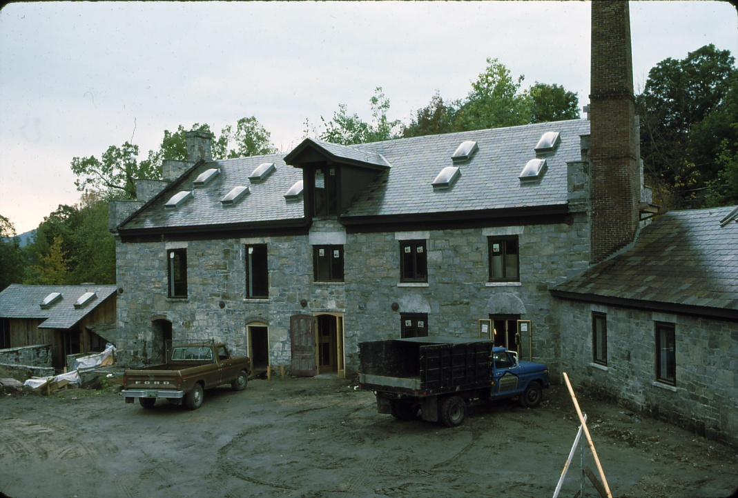 View of construction on the paper mill during the conversion to residential…