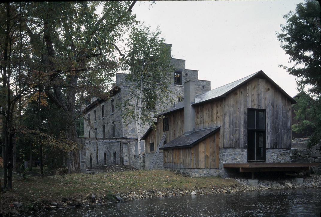 View of construction on the paper mill during the conversion to residential…