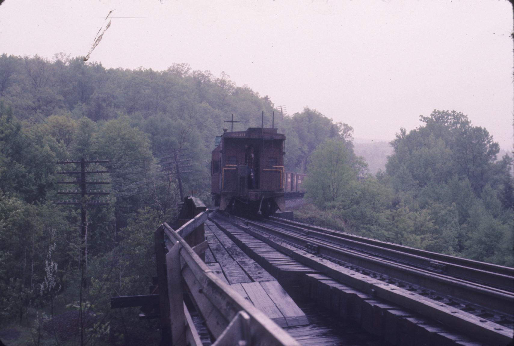 Baywindow caboose on trestle near Shohola Pennsylvania