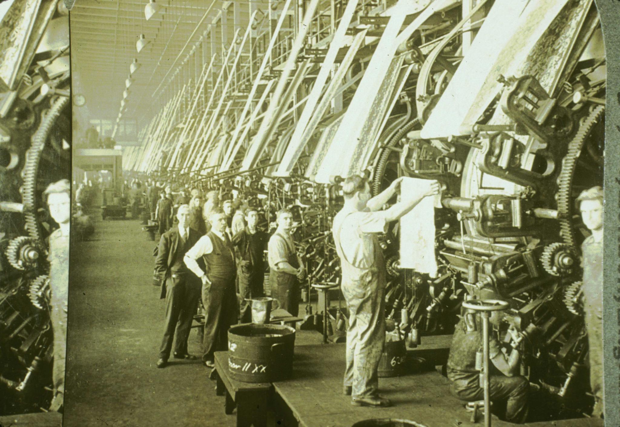 Historic photograph of cloth printing machines in an unidentified New England…