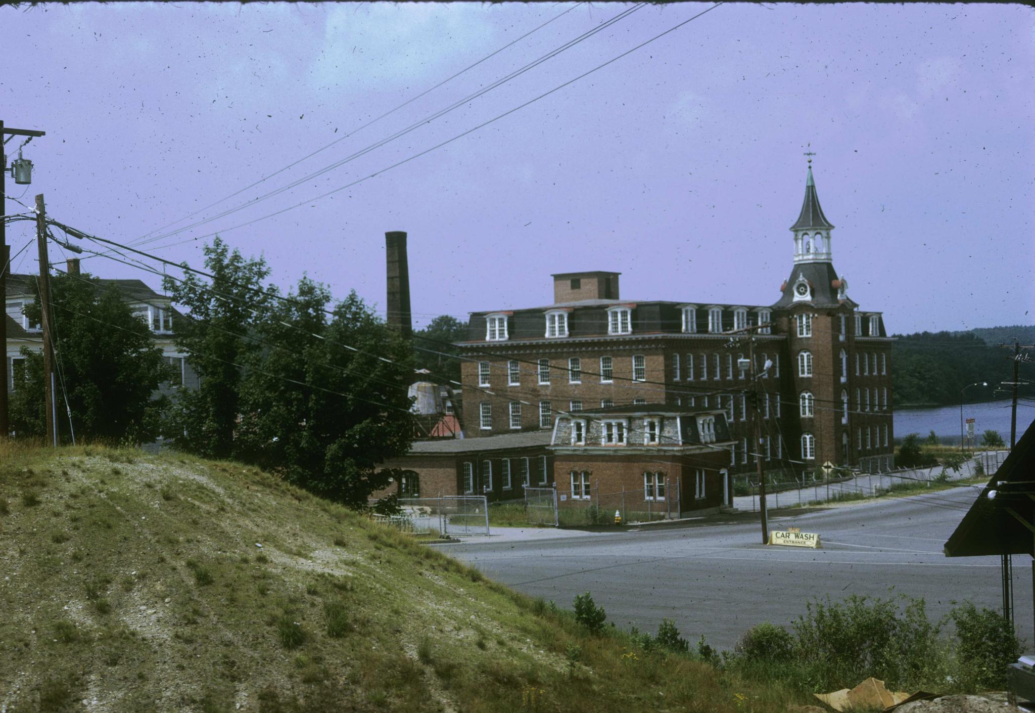 Photograph of the mill showing front and side elevations.