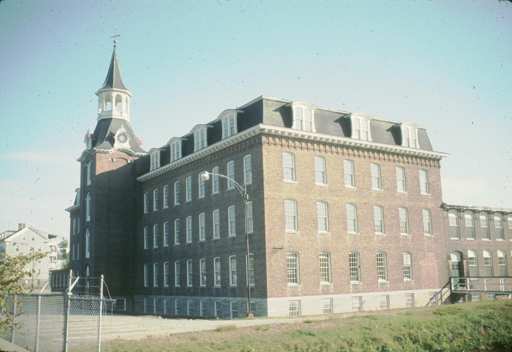 Picture of the mill from the river side showing the front and side elevations.