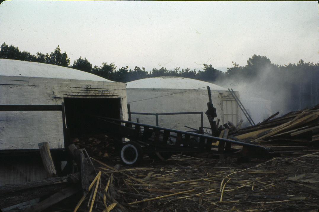 View of fired charcoal kilns.