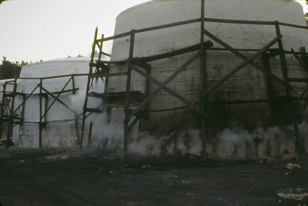 View of fired charcoal kilns.