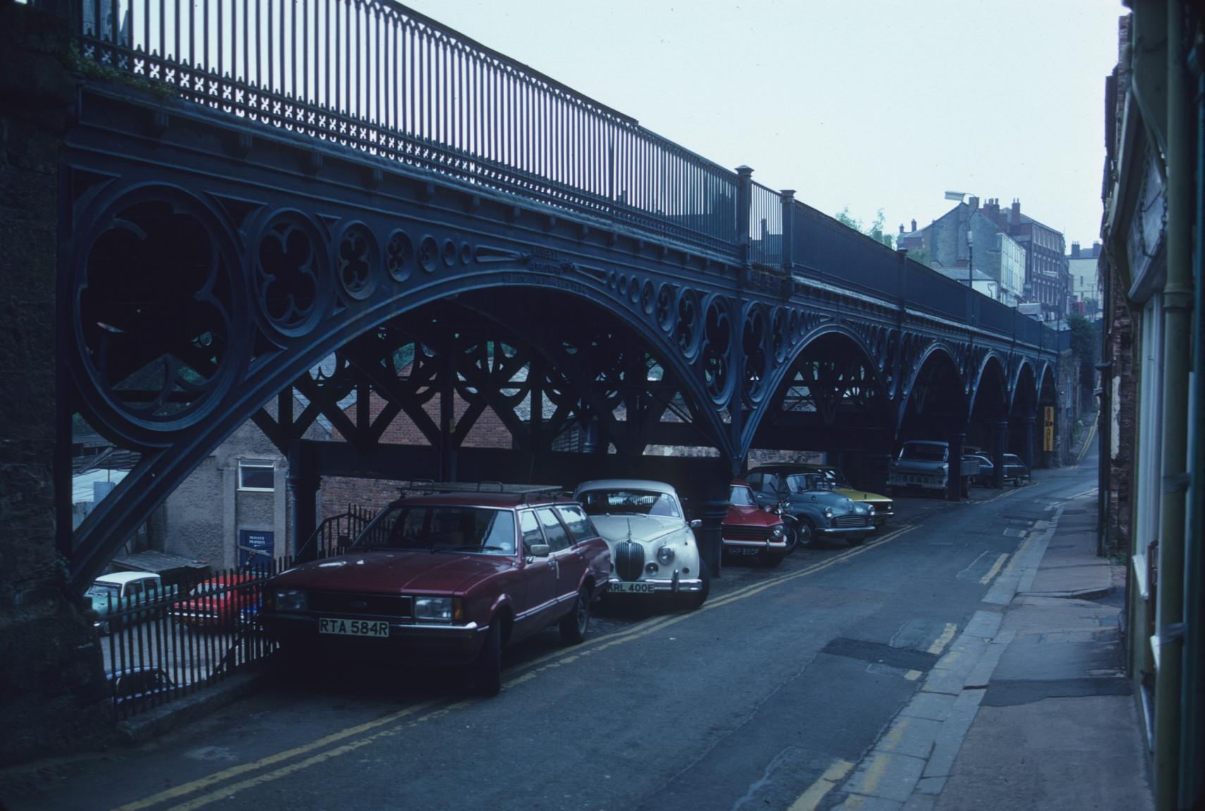 view of all six cast iron spans and partial view of masonry abutment