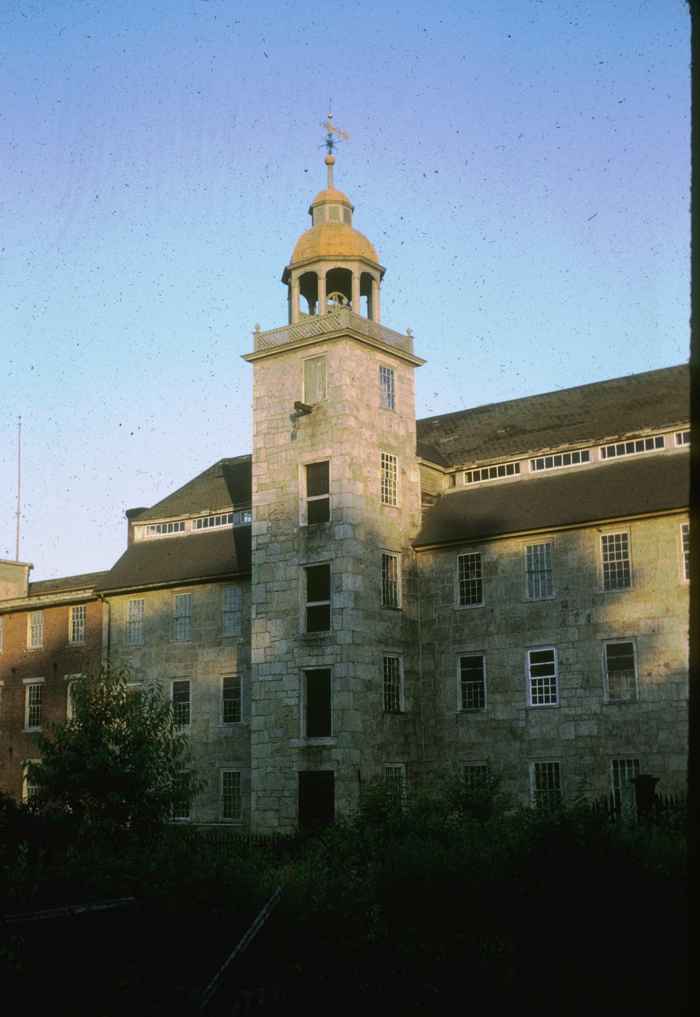 Photograph detailing one of the towers of the mill.